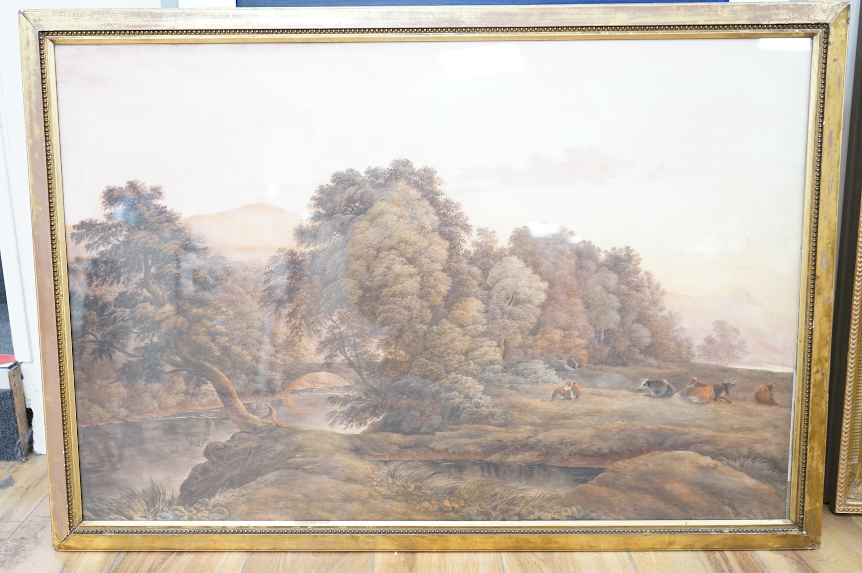 John Conor (19th. C), watercolour, Riverscape with resting cattle, provenance details verso, 58 x 88cm. Condition - fair